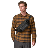 Patagonia Black Hole Waist Pack 5L Black - Front wearing dude